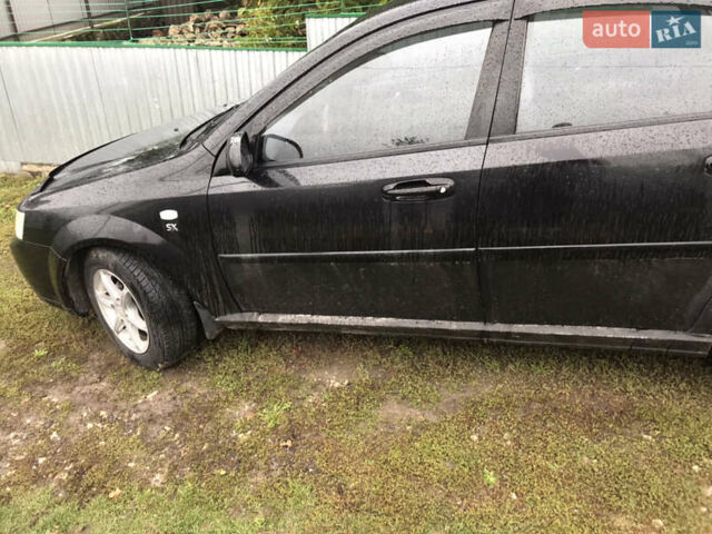 Чорний Шевроле Лачетті, об'ємом двигуна 1.8 л та пробігом 233 тис. км за 4100 $, фото 4 на Automoto.ua