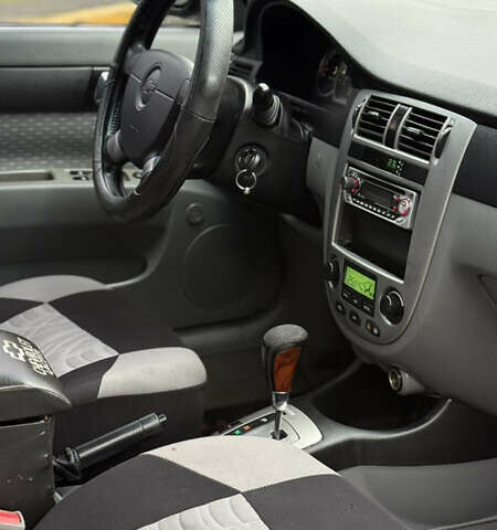 Черный Шевроле Лачетти, объемом двигателя 1.8 л и пробегом 190 тыс. км за 3650 $, фото 10 на Automoto.ua