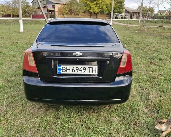 Черный Шевроле Лачетти, объемом двигателя 1.8 л и пробегом 360 тыс. км за 3300 $, фото 6 на Automoto.ua