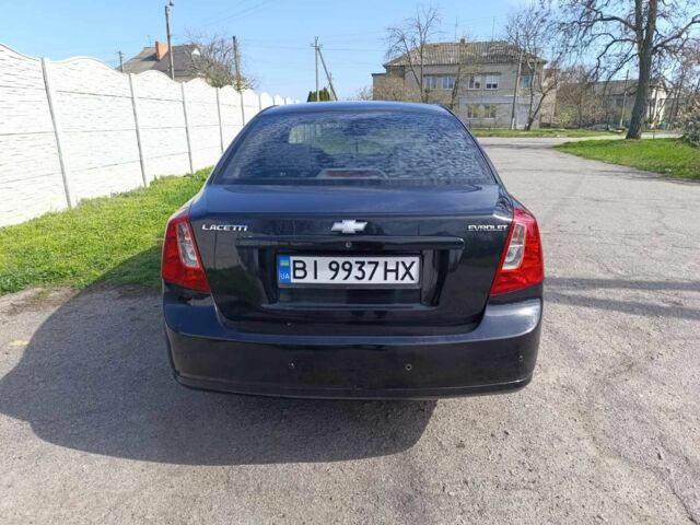 Черный Шевроле Лачетти, объемом двигателя 1.8 л и пробегом 241 тыс. км за 4500 $, фото 6 на Automoto.ua