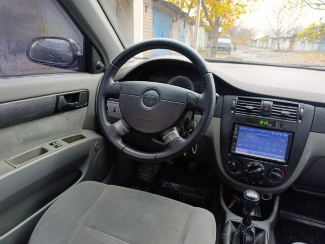 Черный Шевроле Лачетти, объемом двигателя 1.6 л и пробегом 245 тыс. км за 3650 $, фото 7 на Automoto.ua