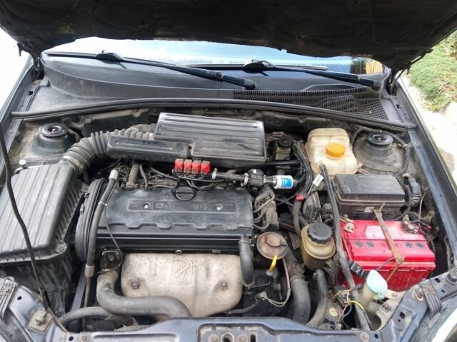 Черный Шевроле Лачетти, объемом двигателя 1.8 л и пробегом 307 тыс. км за 2700 $, фото 9 на Automoto.ua