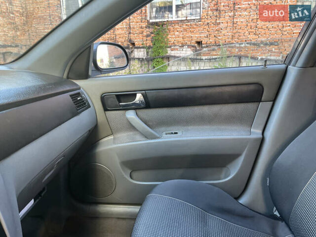 Черный Шевроле Лачетти, объемом двигателя 1.8 л и пробегом 228 тыс. км за 3000 $, фото 13 на Automoto.ua