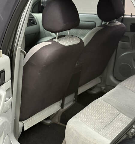 Черный Шевроле Лачетти, объемом двигателя 1.8 л и пробегом 190 тыс. км за 3650 $, фото 9 на Automoto.ua