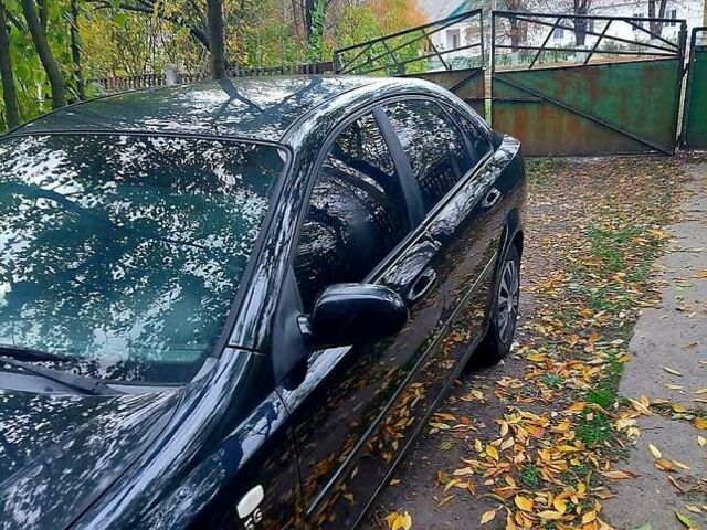 Черный Шевроле Лачетти, объемом двигателя 1.8 л и пробегом 203 тыс. км за 3800 $, фото 3 на Automoto.ua