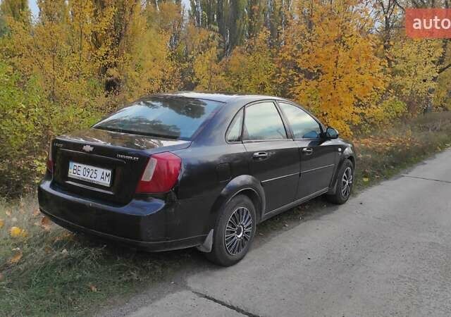 Черный Шевроле Лачетти, объемом двигателя 1.8 л и пробегом 390 тыс. км за 3100 $, фото 9 на Automoto.ua