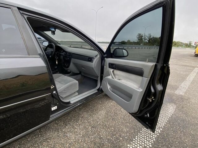 Черный Шевроле Лачетти, объемом двигателя 1.6 л и пробегом 170 тыс. км за 3800 $, фото 12 на Automoto.ua