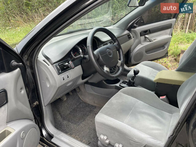 Чорний Шевроле Лачетті, об'ємом двигуна 1.6 л та пробігом 248 тис. км за 3333 $, фото 13 на Automoto.ua