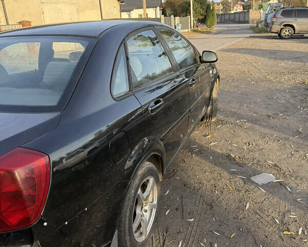 Черный Шевроле Лачетти, объемом двигателя 1.6 л и пробегом 180 тыс. км за 2200 $, фото 2 на Automoto.ua