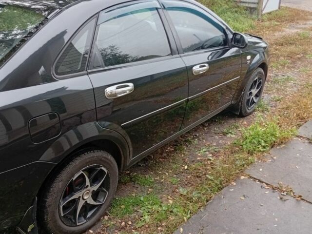 Черный Шевроле Лачетти, объемом двигателя 1.8 л и пробегом 256 тыс. км за 4500 $, фото 2 на Automoto.ua