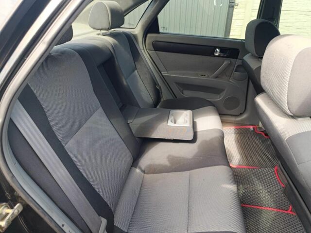 Черный Шевроле Лачетти, объемом двигателя 1.8 л и пробегом 241 тыс. км за 4500 $, фото 2 на Automoto.ua