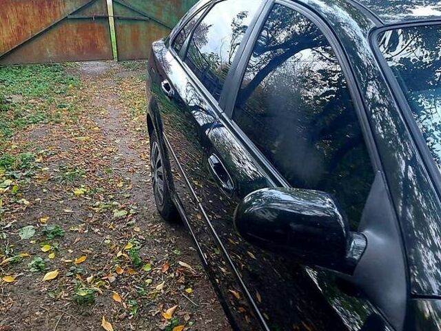 Черный Шевроле Лачетти, объемом двигателя 1.8 л и пробегом 203 тыс. км за 3800 $, фото 2 на Automoto.ua