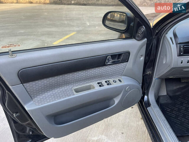 Черный Шевроле Лачетти, объемом двигателя 1.8 л и пробегом 180 тыс. км за 2850 $, фото 6 на Automoto.ua