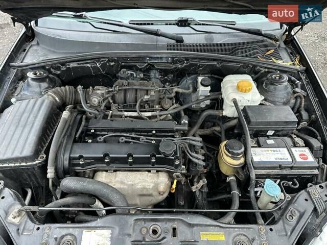 Черный Шевроле Лачетти, объемом двигателя 1.6 л и пробегом 280 тыс. км за 2999 $, фото 45 на Automoto.ua