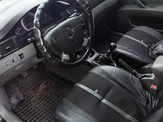 Черный Шевроле Лачетти, объемом двигателя 1.8 л и пробегом 256 тыс. км за 4500 $, фото 8 на Automoto.ua