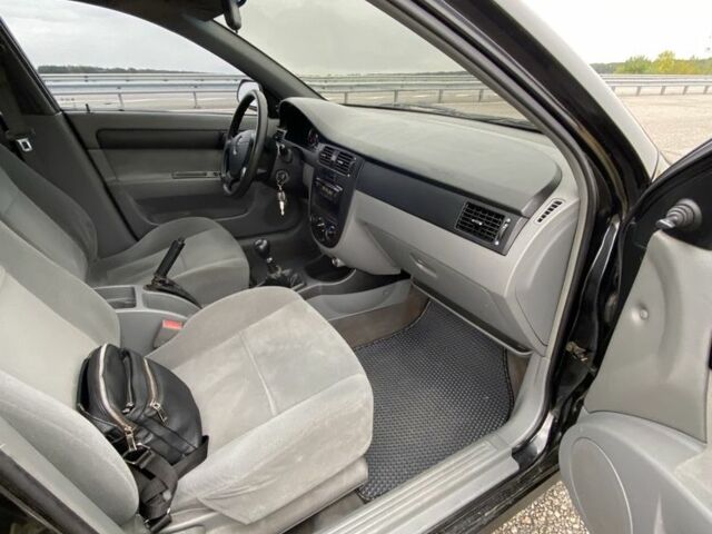 Черный Шевроле Лачетти, объемом двигателя 1.6 л и пробегом 170 тыс. км за 3800 $, фото 11 на Automoto.ua