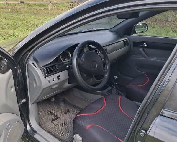 Черный Шевроле Лачетти, объемом двигателя 1.8 л и пробегом 360 тыс. км за 3300 $, фото 11 на Automoto.ua