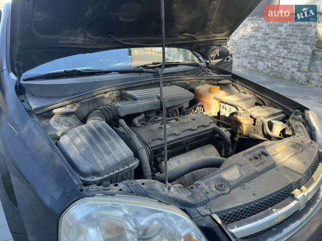 Черный Шевроле Лачетти, объемом двигателя 1.8 л и пробегом 228 тыс. км за 3000 $, фото 16 на Automoto.ua