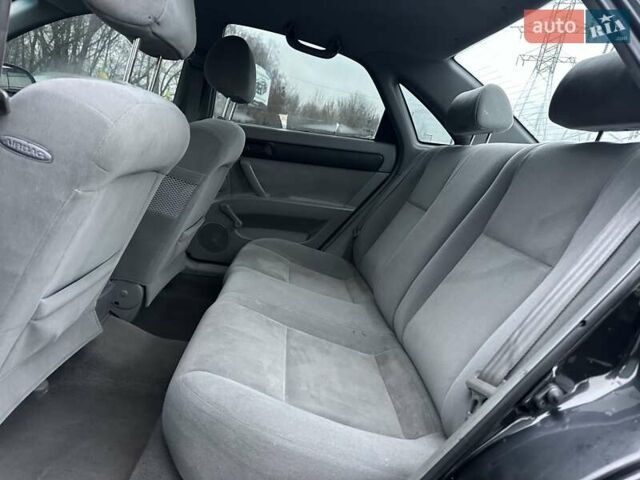 Черный Шевроле Лачетти, объемом двигателя 1.6 л и пробегом 280 тыс. км за 2999 $, фото 33 на Automoto.ua