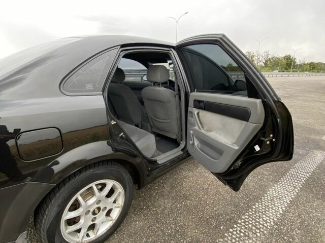 Черный Шевроле Лачетти, объемом двигателя 1.6 л и пробегом 170 тыс. км за 3800 $, фото 9 на Automoto.ua