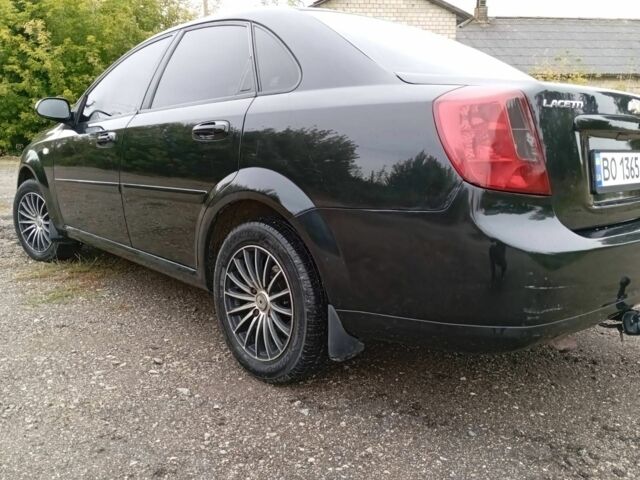 Чорний Шевроле Лачетті, об'ємом двигуна 1.8 л та пробігом 185 тис. км за 3900 $, фото 2 на Automoto.ua