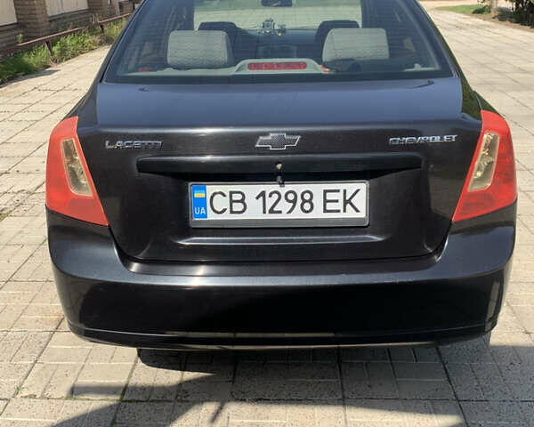 Чорний Шевроле Лачетті, об'ємом двигуна 1.8 л та пробігом 250 тис. км за 3900 $, фото 19 на Automoto.ua