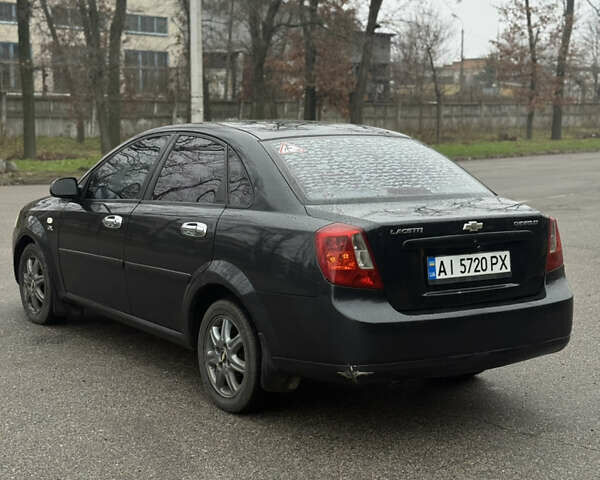 Черный Шевроле Лачетти, объемом двигателя 1.8 л и пробегом 230 тыс. км за 3200 $, фото 5 на Automoto.ua