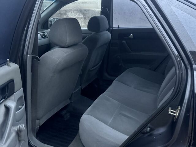 Черный Шевроле Лачетти, объемом двигателя 1.8 л и пробегом 220 тыс. км за 2950 $, фото 6 на Automoto.ua