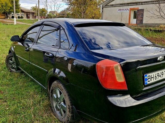 Черный Шевроле Лачетти, объемом двигателя 1.8 л и пробегом 360 тыс. км за 3400 $, фото 3 на Automoto.ua