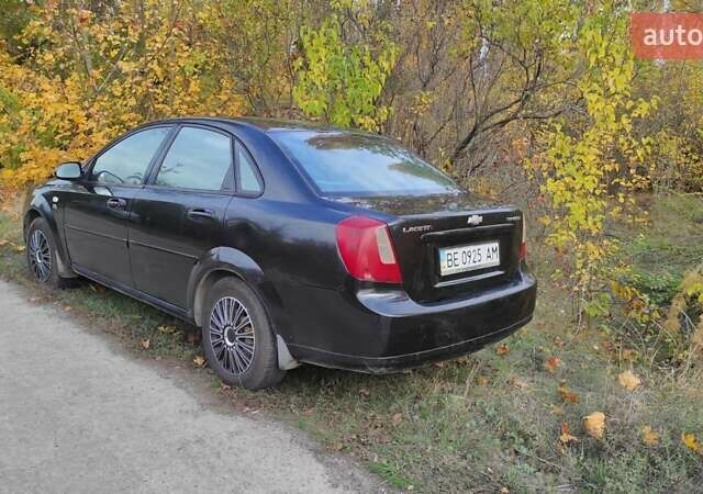 Черный Шевроле Лачетти, объемом двигателя 1.8 л и пробегом 390 тыс. км за 3100 $, фото 11 на Automoto.ua