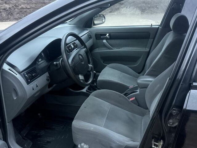 Черный Шевроле Лачетти, объемом двигателя 1.8 л и пробегом 220 тыс. км за 2950 $, фото 8 на Automoto.ua