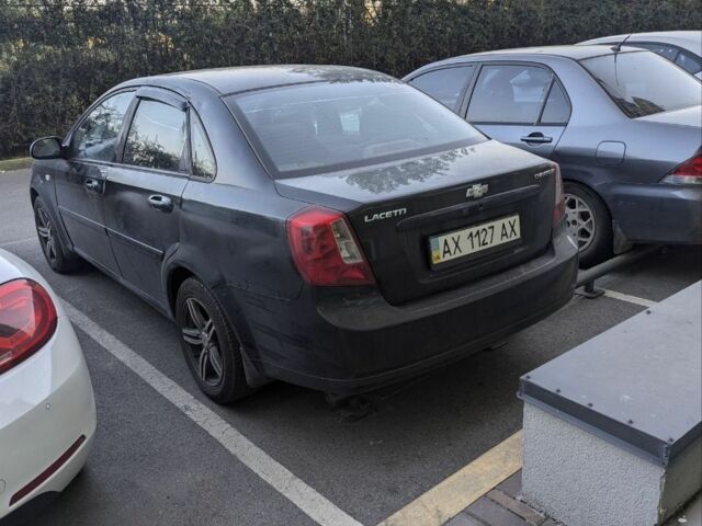 Черный Шевроле Лачетти, объемом двигателя 1.6 л и пробегом 400 тыс. км за 3500 $, фото 1 на Automoto.ua