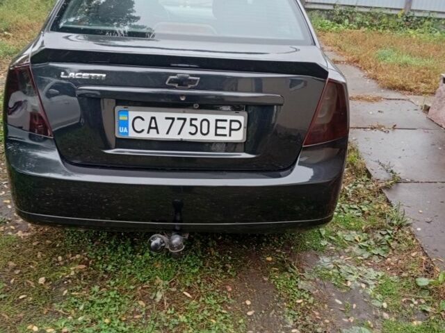 Черный Шевроле Лачетти, объемом двигателя 1.8 л и пробегом 256 тыс. км за 4500 $, фото 1 на Automoto.ua