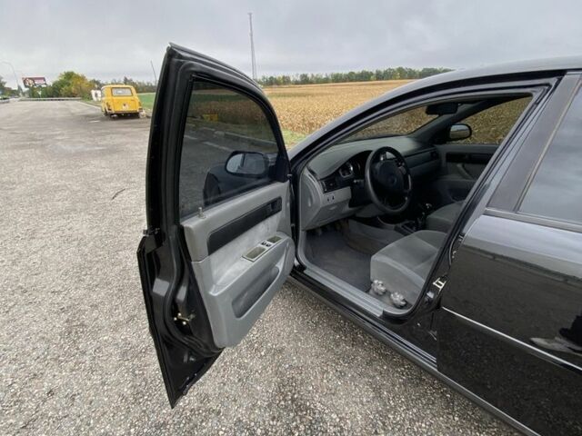 Черный Шевроле Лачетти, объемом двигателя 1.6 л и пробегом 170 тыс. км за 3800 $, фото 8 на Automoto.ua