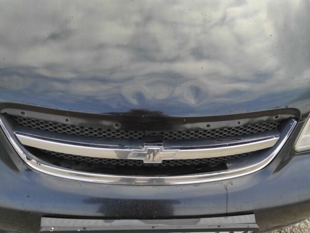 Черный Шевроле Лачетти, объемом двигателя 1.8 л и пробегом 300 тыс. км за 2850 $, фото 9 на Automoto.ua