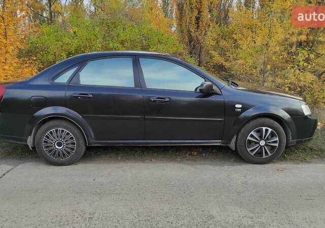 Черный Шевроле Лачетти, объемом двигателя 1.8 л и пробегом 390 тыс. км за 3100 $, фото 6 на Automoto.ua