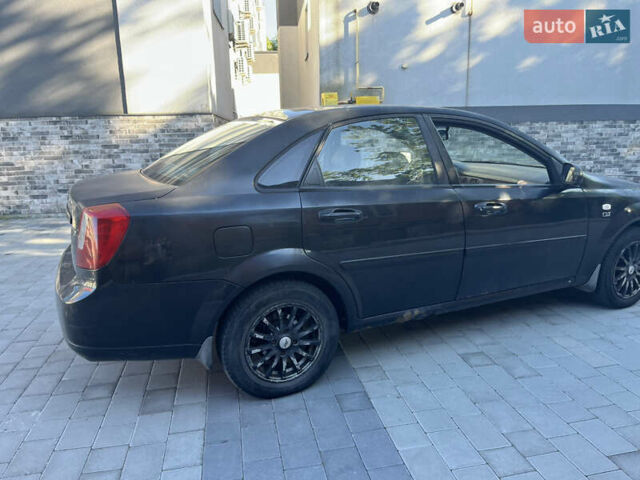 Черный Шевроле Лачетти, объемом двигателя 1.8 л и пробегом 228 тыс. км за 3000 $, фото 5 на Automoto.ua