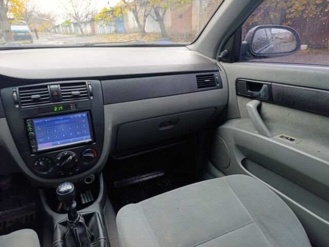 Черный Шевроле Лачетти, объемом двигателя 1.6 л и пробегом 245 тыс. км за 3650 $, фото 8 на Automoto.ua