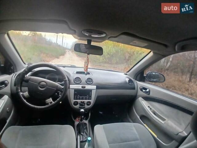 Черный Шевроле Лачетти, объемом двигателя 1.8 л и пробегом 297 тыс. км за 2450 $, фото 3 на Automoto.ua