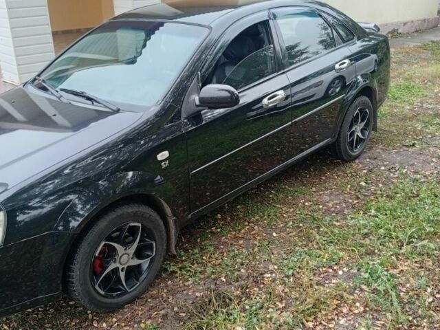 Черный Шевроле Лачетти, объемом двигателя 1.8 л и пробегом 256 тыс. км за 4500 $, фото 3 на Automoto.ua