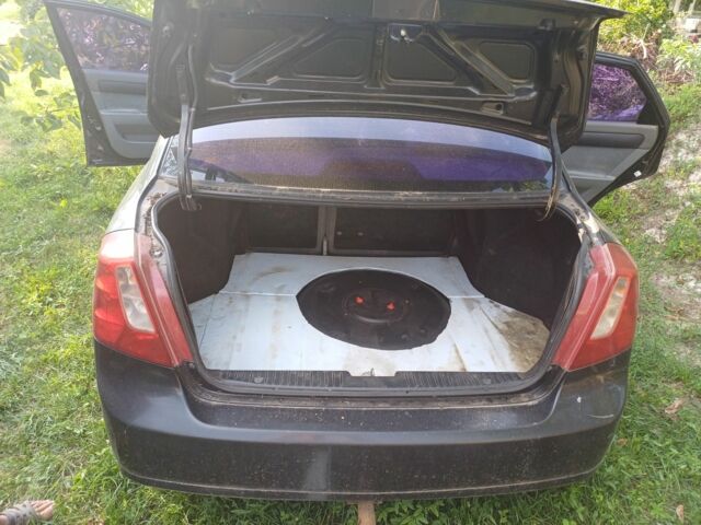 Чорний Шевроле Лачетті, об'ємом двигуна 1.8 л та пробігом 200 тис. км за 953 $, фото 3 на Automoto.ua