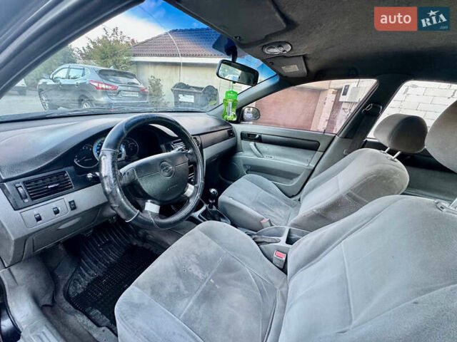 Чорний Шевроле Лачетті, об'ємом двигуна 1.6 л та пробігом 185 тис. км за 2800 $, фото 14 на Automoto.ua