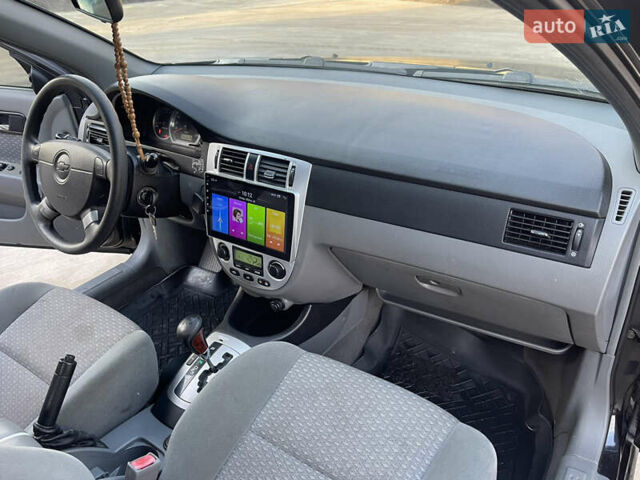 Черный Шевроле Лачетти, объемом двигателя 1.8 л и пробегом 180 тыс. км за 2850 $, фото 7 на Automoto.ua