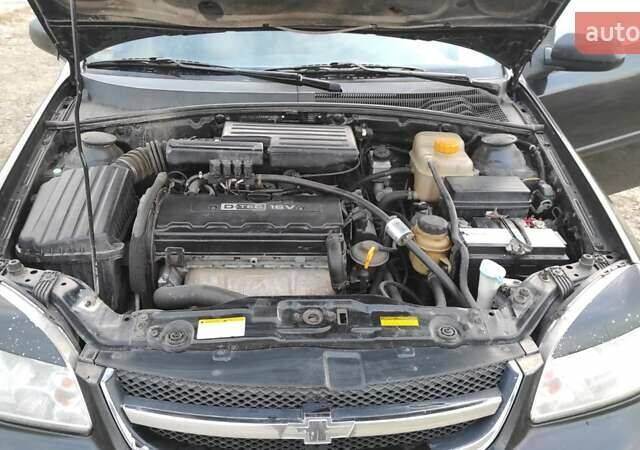 Черный Шевроле Лачетти, объемом двигателя 1.8 л и пробегом 390 тыс. км за 3100 $, фото 12 на Automoto.ua