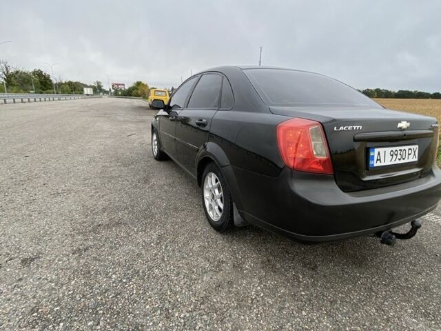 Черный Шевроле Лачетти, объемом двигателя 1.6 л и пробегом 170 тыс. км за 3800 $, фото 3 на Automoto.ua