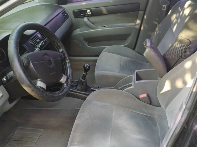 Чорний Шевроле Лачетті, об'ємом двигуна 1.8 л та пробігом 200 тис. км за 953 $, фото 4 на Automoto.ua