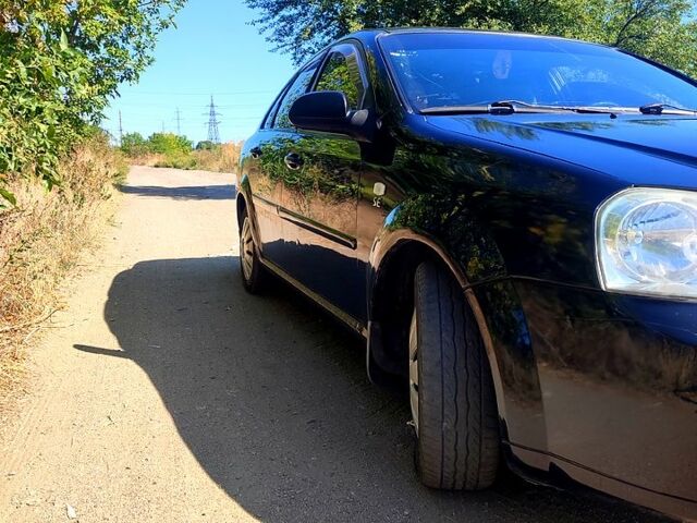 Черный Шевроле Лачетти, объемом двигателя 1.6 л и пробегом 230 тыс. км за 3000 $, фото 2 на Automoto.ua