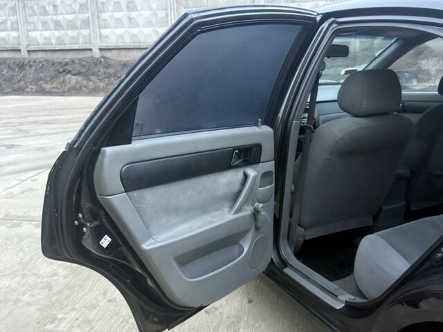 Черный Шевроле Лачетти, объемом двигателя 1.8 л и пробегом 220 тыс. км за 2950 $, фото 7 на Automoto.ua