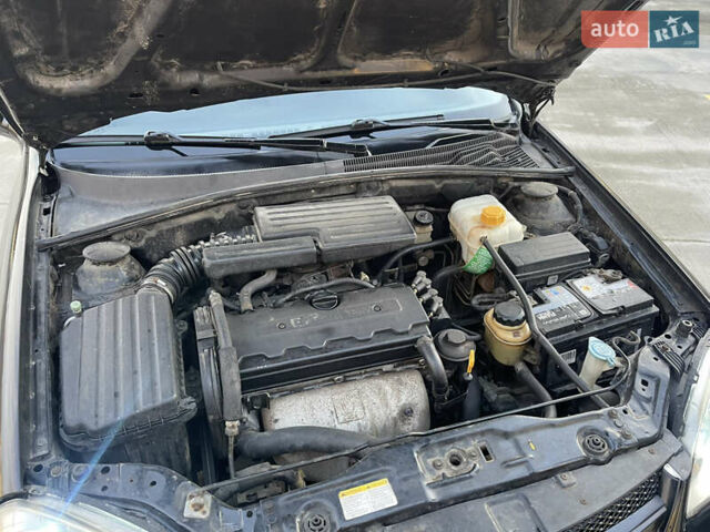 Черный Шевроле Лачетти, объемом двигателя 1.8 л и пробегом 180 тыс. км за 2850 $, фото 9 на Automoto.ua