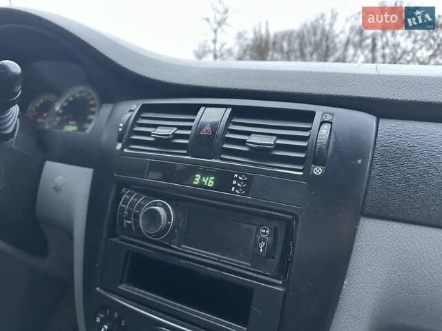 Черный Шевроле Лачетти, объемом двигателя 1.6 л и пробегом 280 тыс. км за 2999 $, фото 41 на Automoto.ua